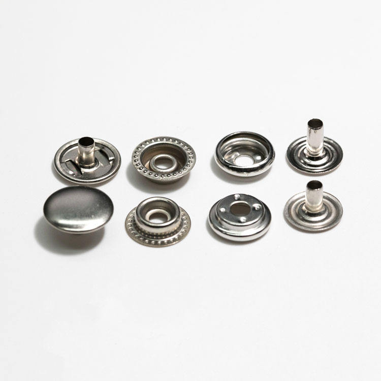 Close-up of premium zinc alloy press button on leather handbag
