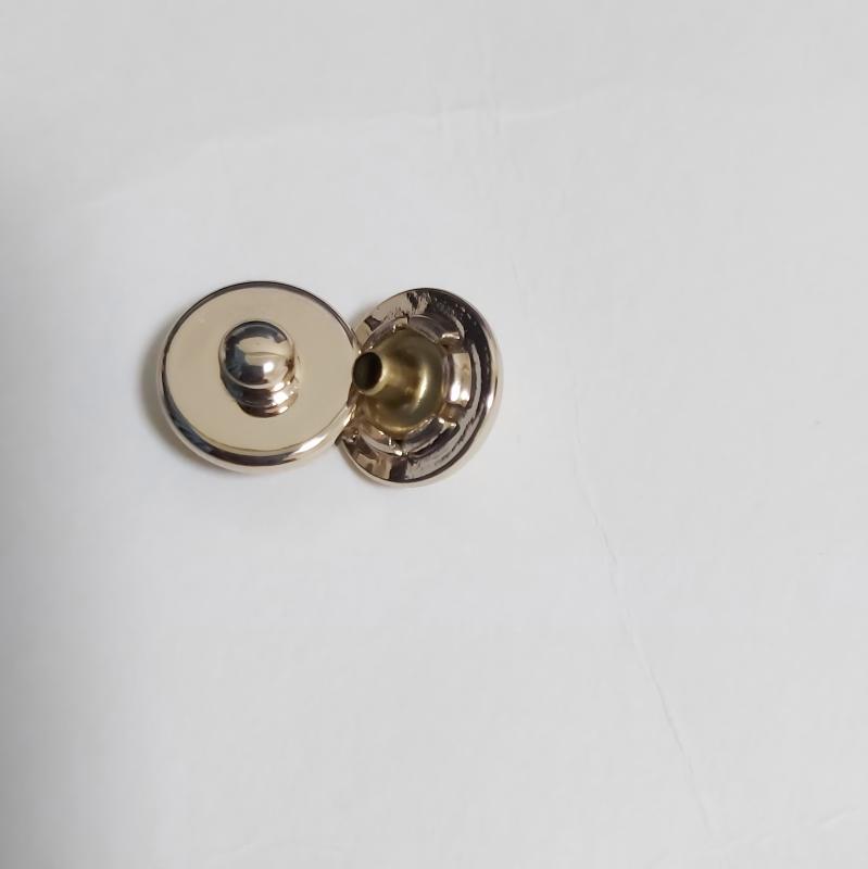 Luxury bag hardware featuring zinc alloy press button